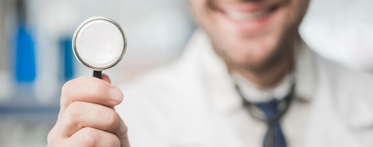 doctor holding stethescope